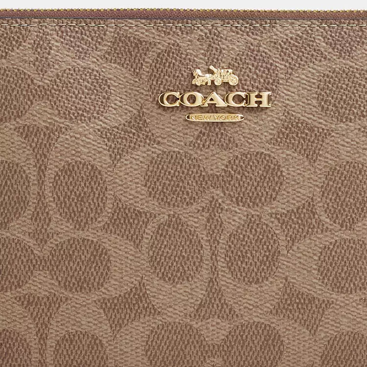 Coach Large Corner Zip Wristlet
In Signature Canvas