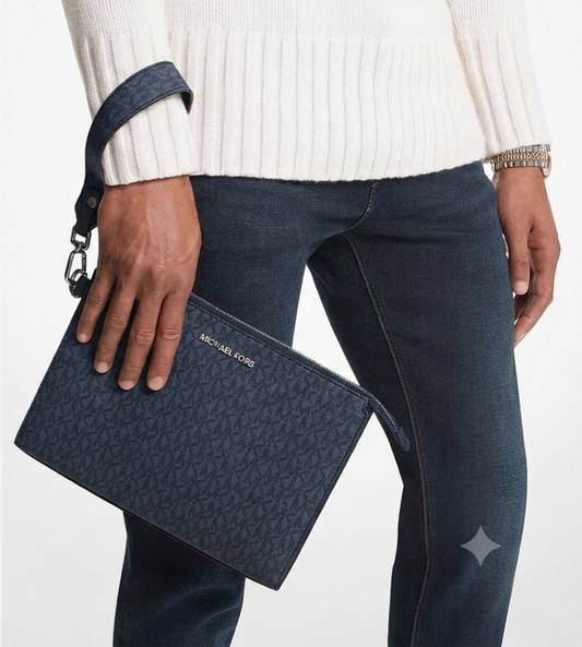 Michael Kors Cooper pouch shown with detachable wristlet strap attached
