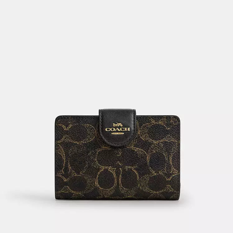 Coach Medium Corner Zip Wallet
In Loved Signature Canvas