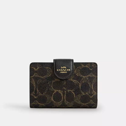 Coach Medium Corner Zip Wallet
In Loved Signature Canvas