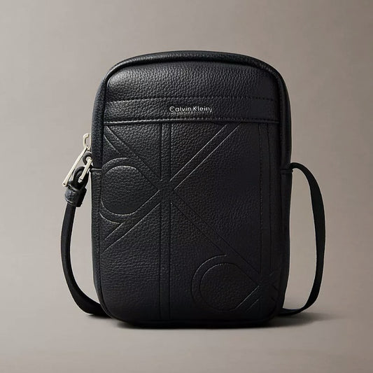 Calvin Klein embossed emblem logo slim reporter bag in black – authentic Calvin Klein Sri Lanka