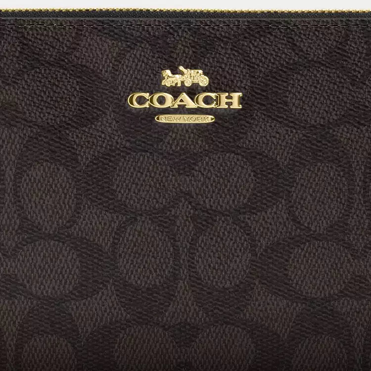 Coach Large Corner Zip Wristlet
In Signature Canvas