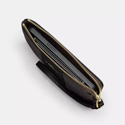 Coach Corner Zip Wristlet In Signature Canvas With Stripe