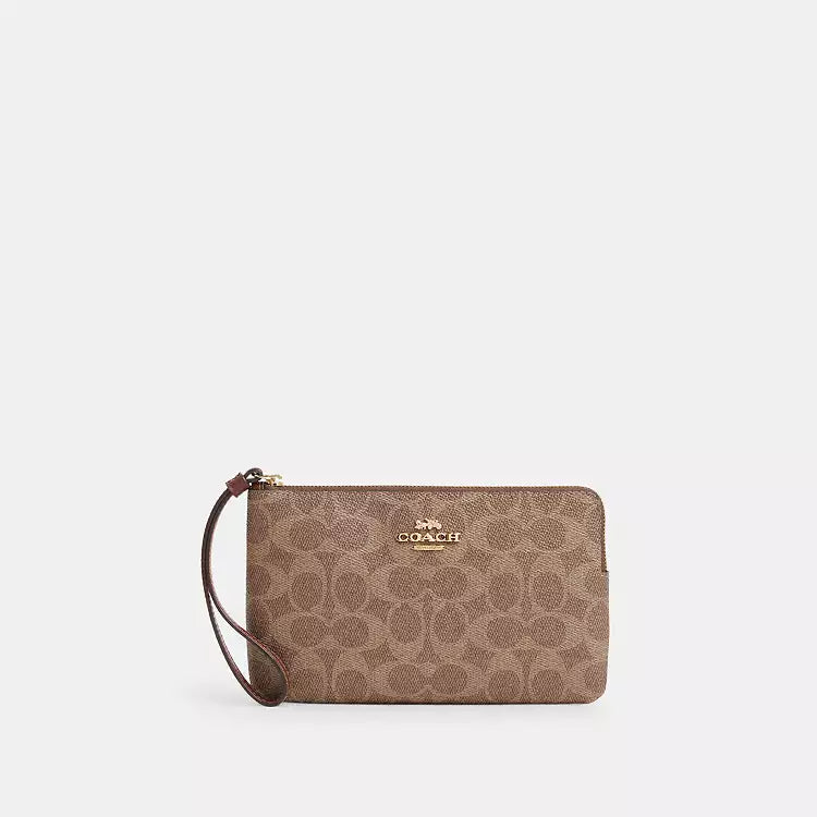 Coach Large Corner Zip Wristlet
In Signature Canvas