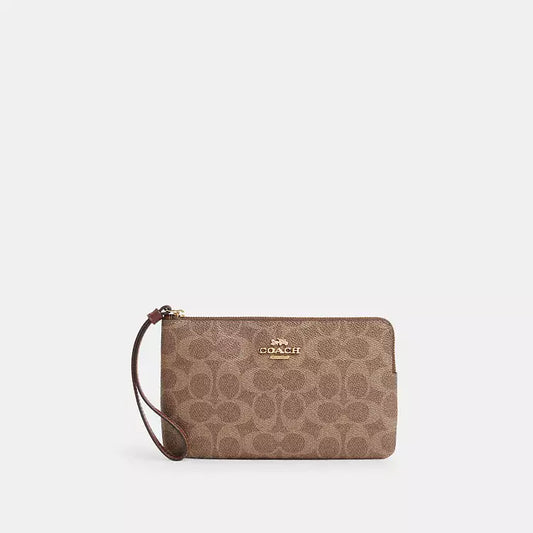 Coach Large Corner Zip Wristlet
In Signature Canvas
